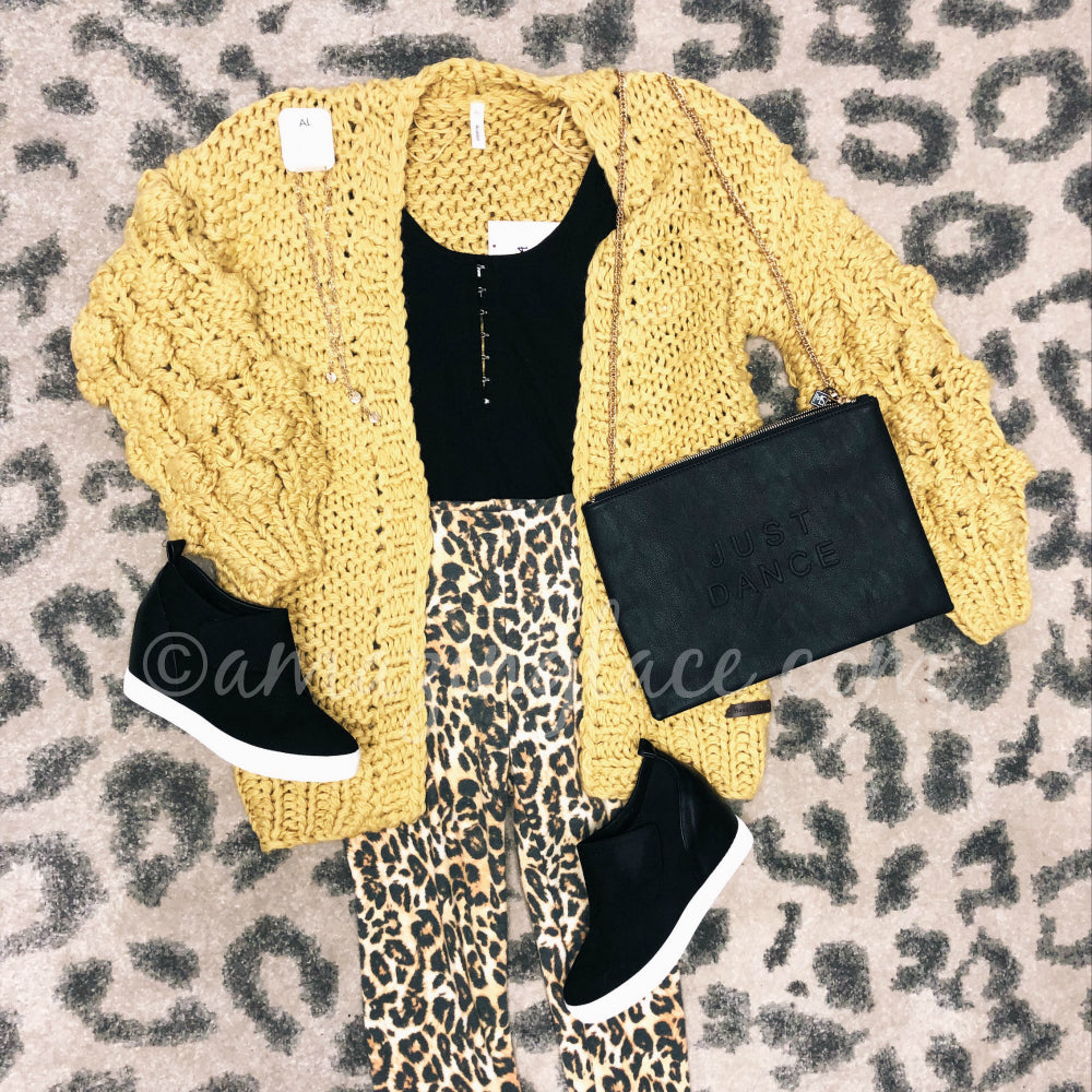 MUSTARD CARDI WITH AMUSE SOOCIETY BODYSUIT, LEOPARD LEGGINGS AND BLACK SNEAKERS OUTFIT