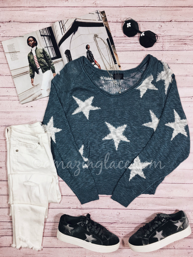 STAR SWEATER AND STAR SNEAKERS OUTFIT