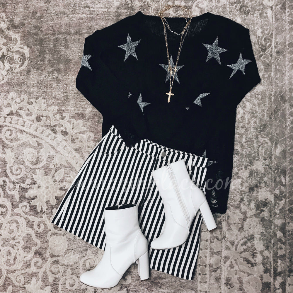 BLACK STAR SWEATER AND STRIPED SKIRT OUTFIT
