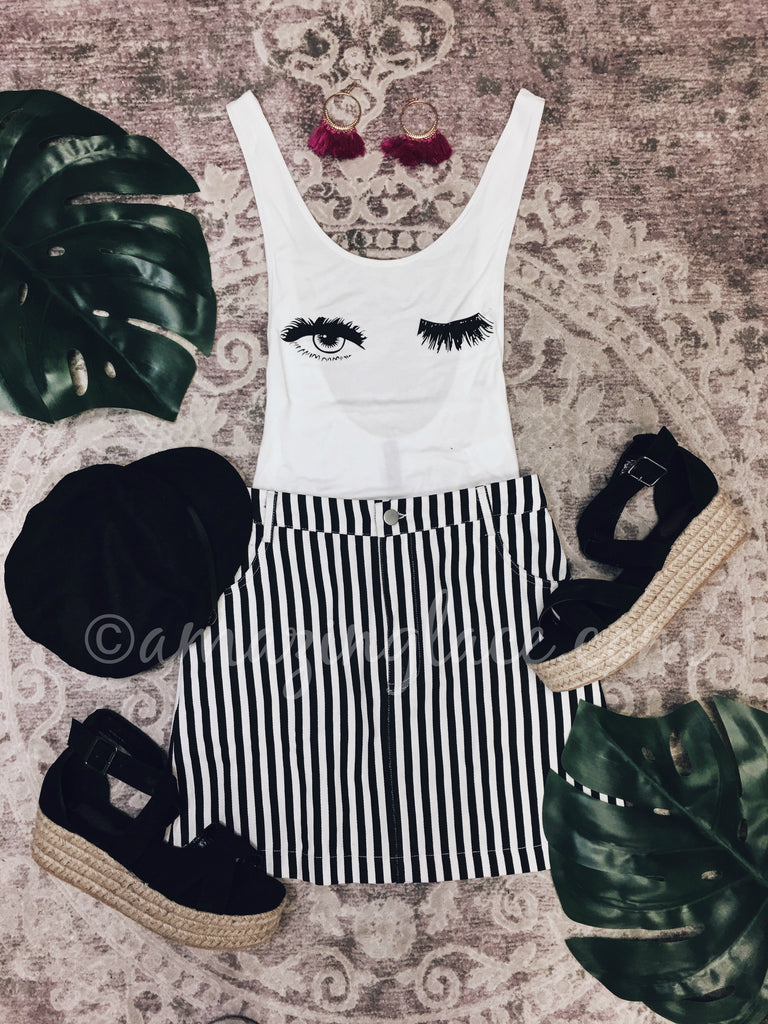 WHITE EYELASH BODYSUIT AND STRIPED SKIRT OUTFIT