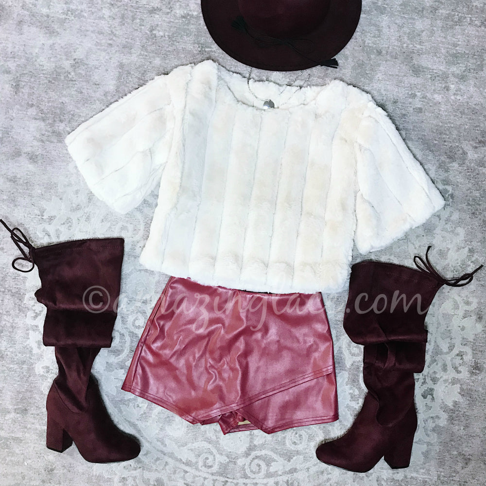 FAUX FUR TOP AND RED SKORT AND BOOTS OUTFIT