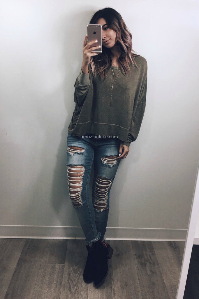 OLIVE SWEATER AND DISTRESSED JEANS OUTFIT