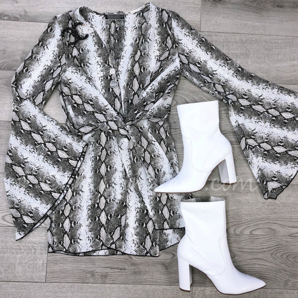 PLUNGING SNAKE DRESS AND WHITE POINTED BOOTIES