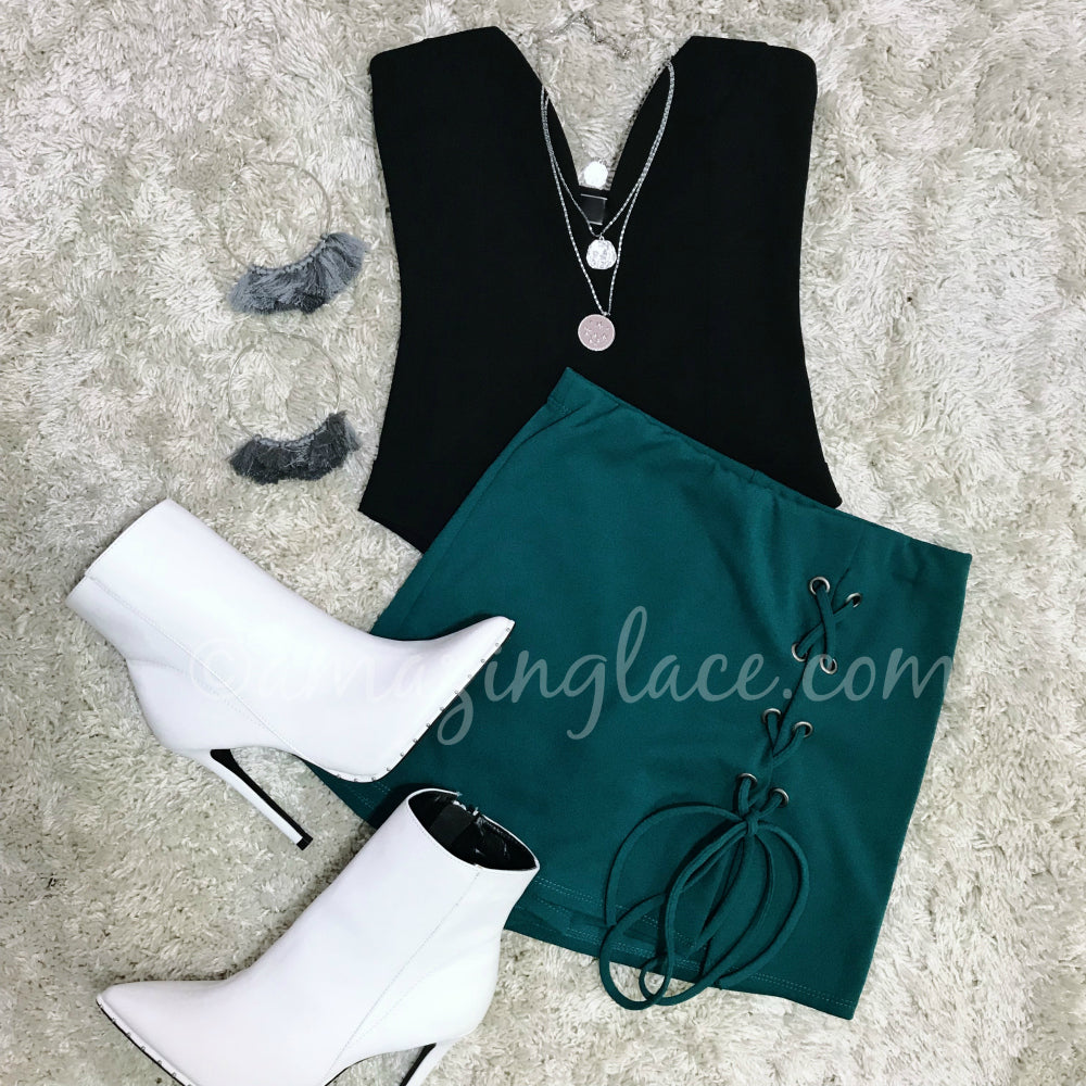 BLACK BODYSUIT AND KELLY GREEN LACE UP SKORT OUTFIT