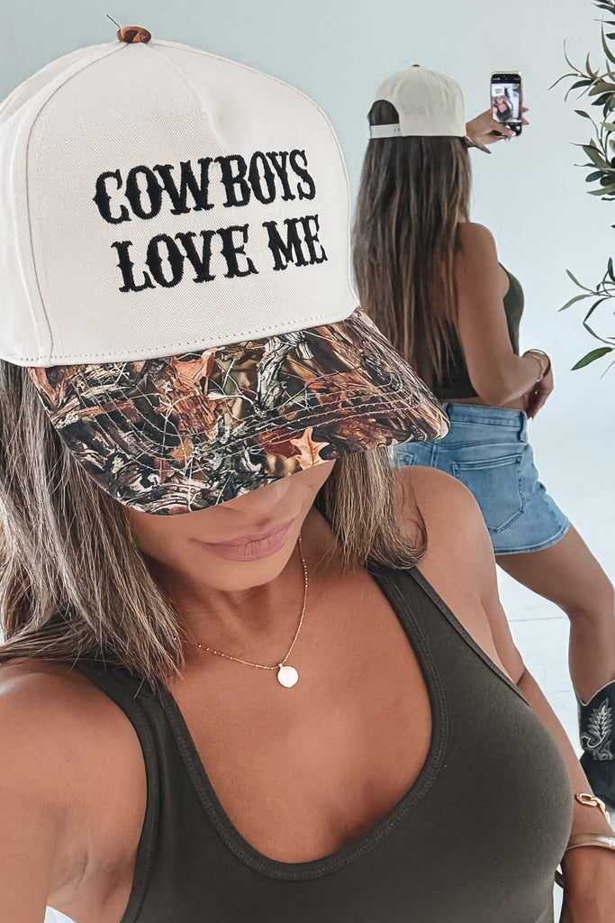 Cowboys love me trucker hat 