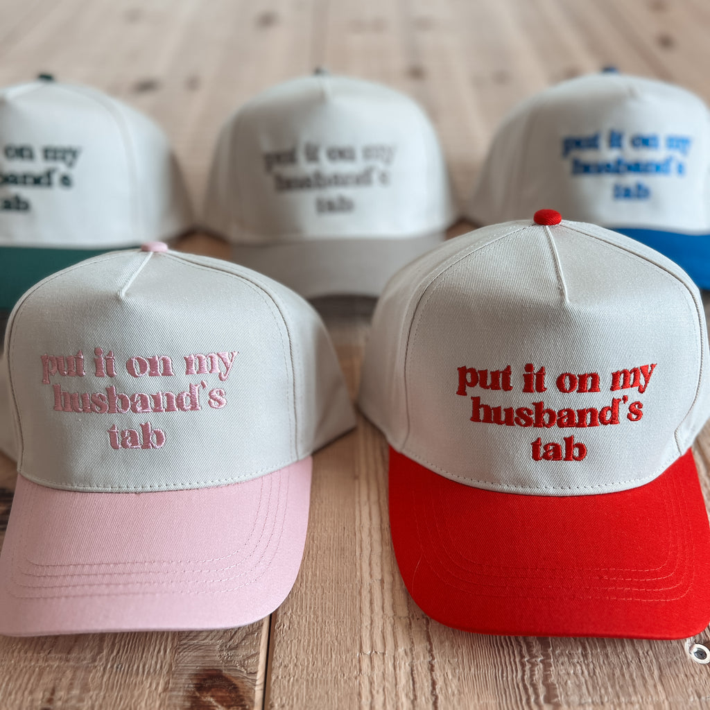 husbands tab trucker hat