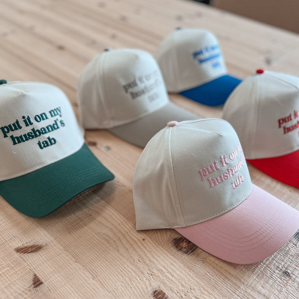 put it on my husband's tab trucker hat